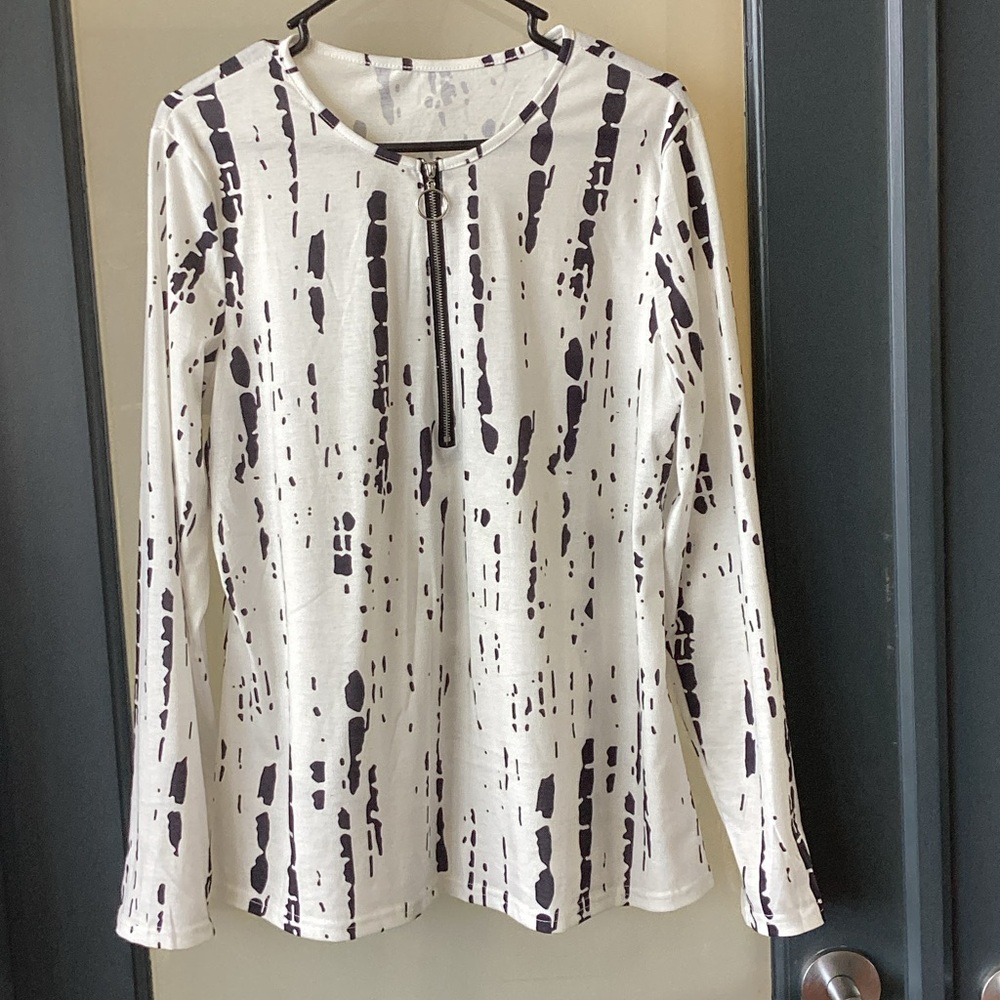 Long sleeved top with half zipper